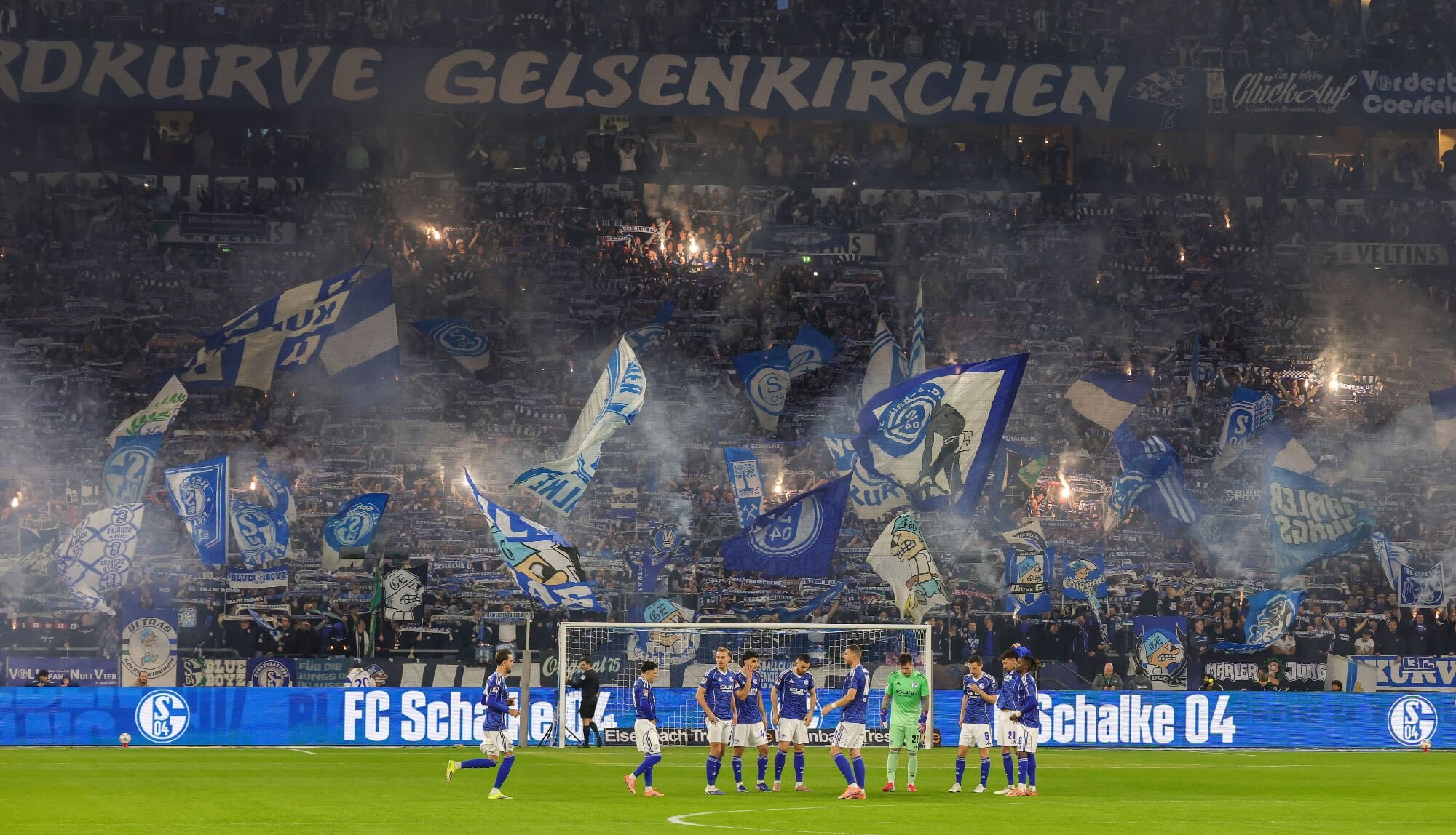 Schalke clinch Bundesliga promotion as Karius, Dzeko shine